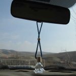 شیشه عطر آویز ماشین طرح گل قروش اینترنتی