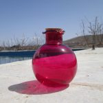 بطری شیشه ای رنگی طرح انار باکیفیت و زیبا با درب چوب پنبه ای